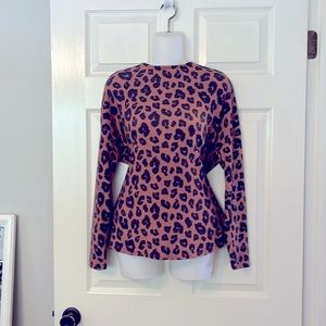 Super cute pullover shirt, size medium. Low cut back